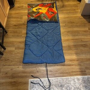 Blue Sleeping Bag with Colorful Flannel Game Bird Lining.